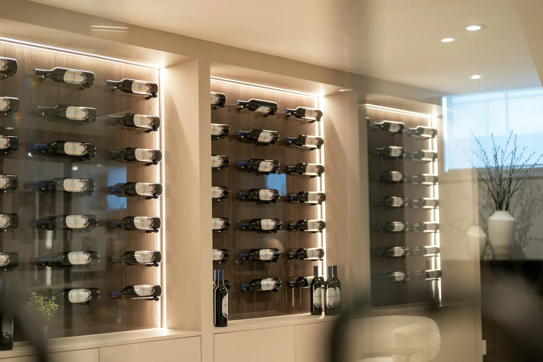 A private cellar wall of wine bottles